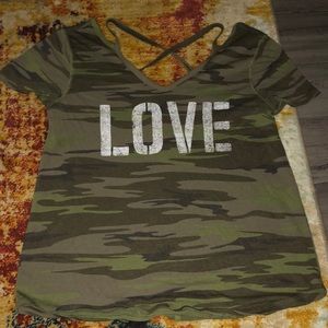 Cute camo short sleeved shirt with crisscrossed back